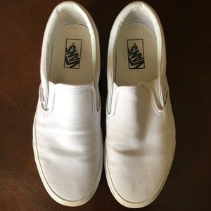 All white slip on vans